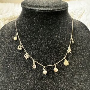 Juicy Couture Silver Hanging Different Charms Necklace